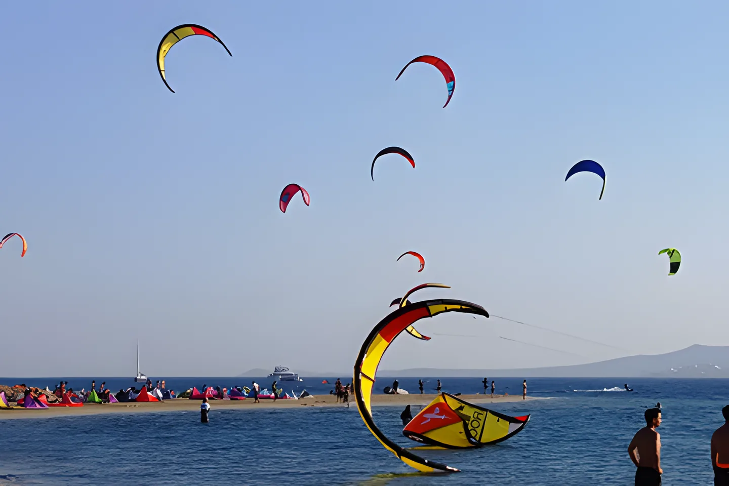Kitesurfers on the water in Paros