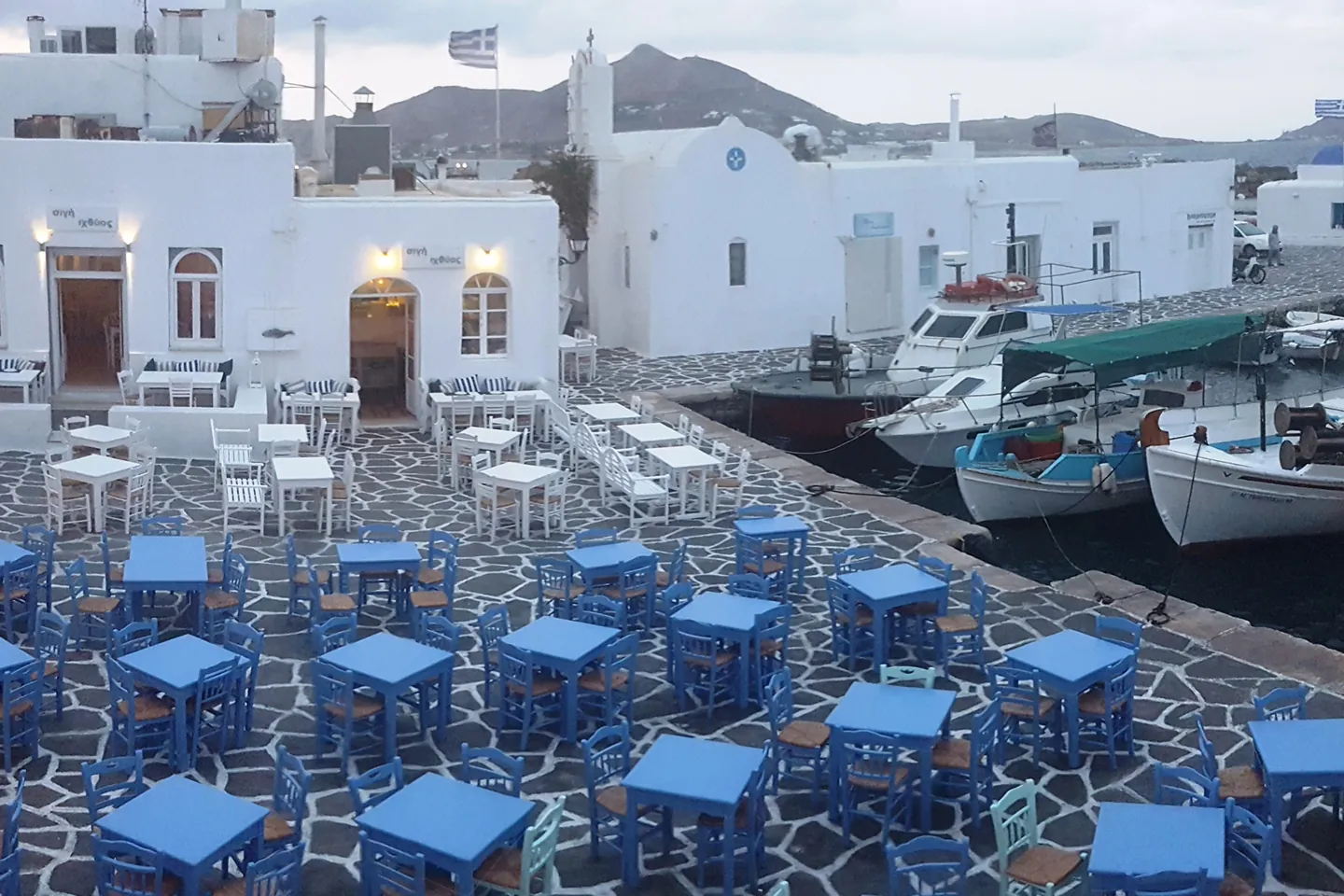 Harbourside taverna tables in Naoussa